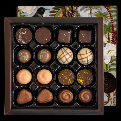 A box of 16 assorted chocolates with a vintage inspired design on the packaging, featuring flavors inspired by New Zealand.